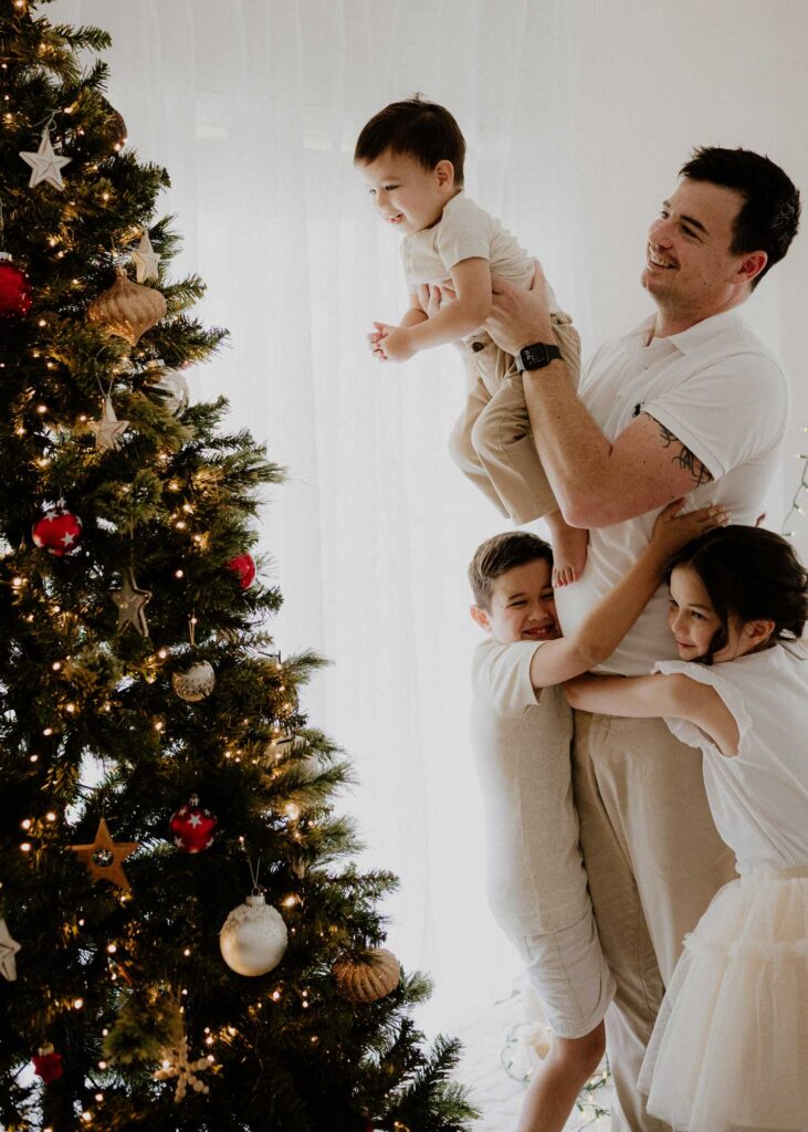 Best Christmas Family Photos Decorating the Tree